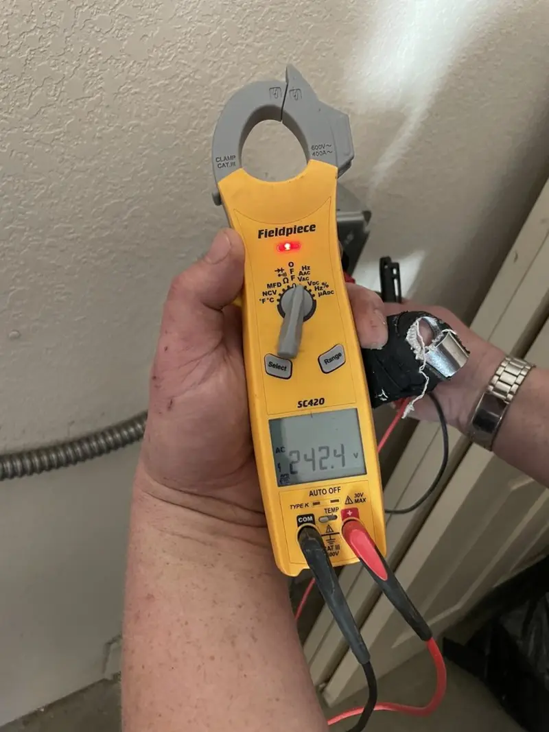 Voltage testing with clamp meter during Aluminum Wiring Replacement in Roseland